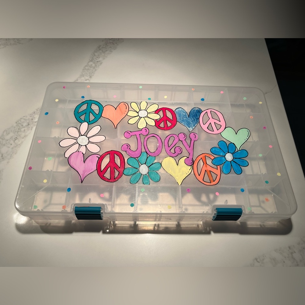 Adorable hand painted plastic craft storage.  The name Joey is painted on top!